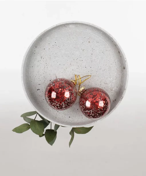 glitter in a glass bauble hanging red