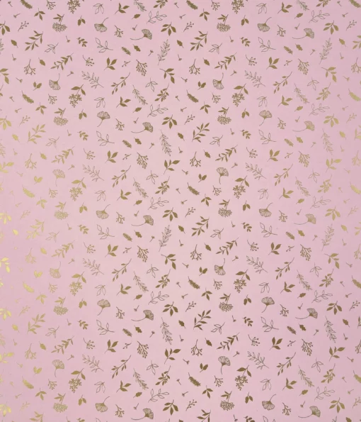 pink gift wrap featuring gold leaves and flowers