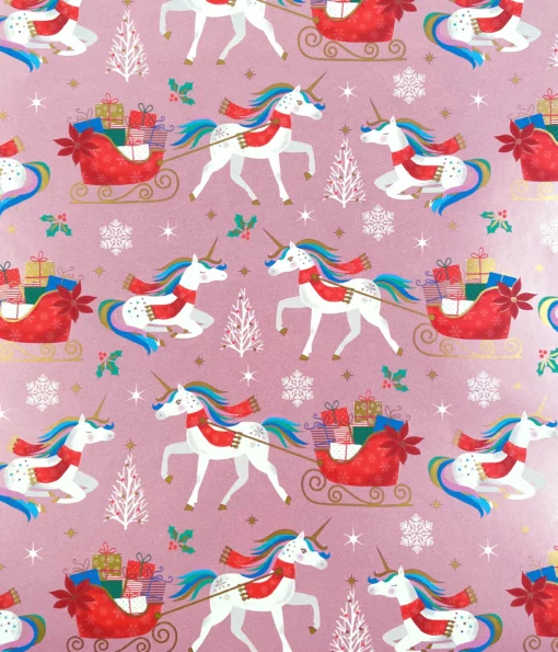 PRINTED GLOSS WRAPPING PAPER BELIEVE IN MAGIC. A fun kids Christmas wrapping paper featuring unicorns pulling Santa's sleigh, on a blushing pink background.