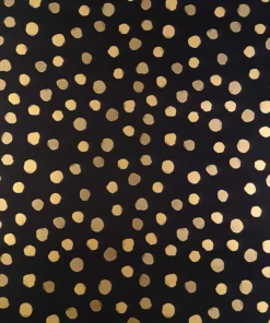 striking wrapping paper design featuring a black background colour which is adorned with metallic unevenly shaped gold spots creating a stunning contrast.