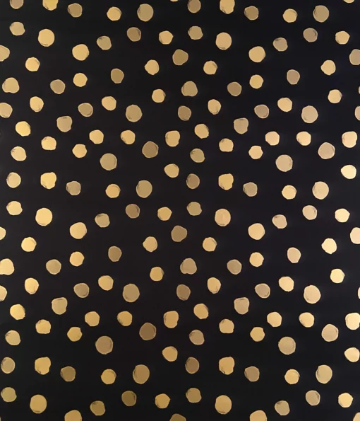 striking wrapping paper design featuring a black background colour which is adorned with metallic unevenly shaped gold spots creating a stunning contrast.